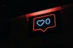 Social media like lit-up sign