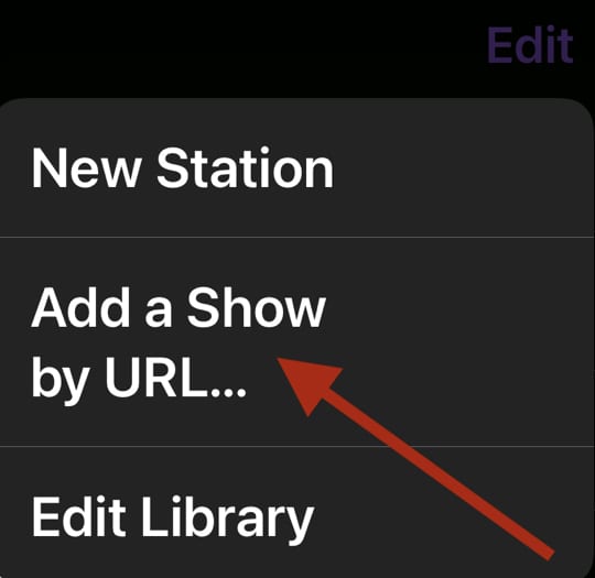 Screenshot of a red arrow pointing at the "Add a Show by URL" link in the Edit menu of the iOS Apple Podcasts app