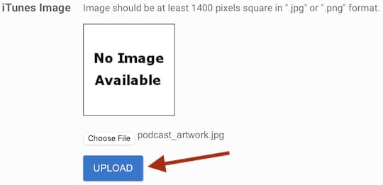 Screenshot of a red arrow pointing at a button marked UPLOAD
